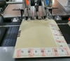 Kecepatan tinggi otomatis dengan mesin pengepakan kertas pemeriksaan semprot